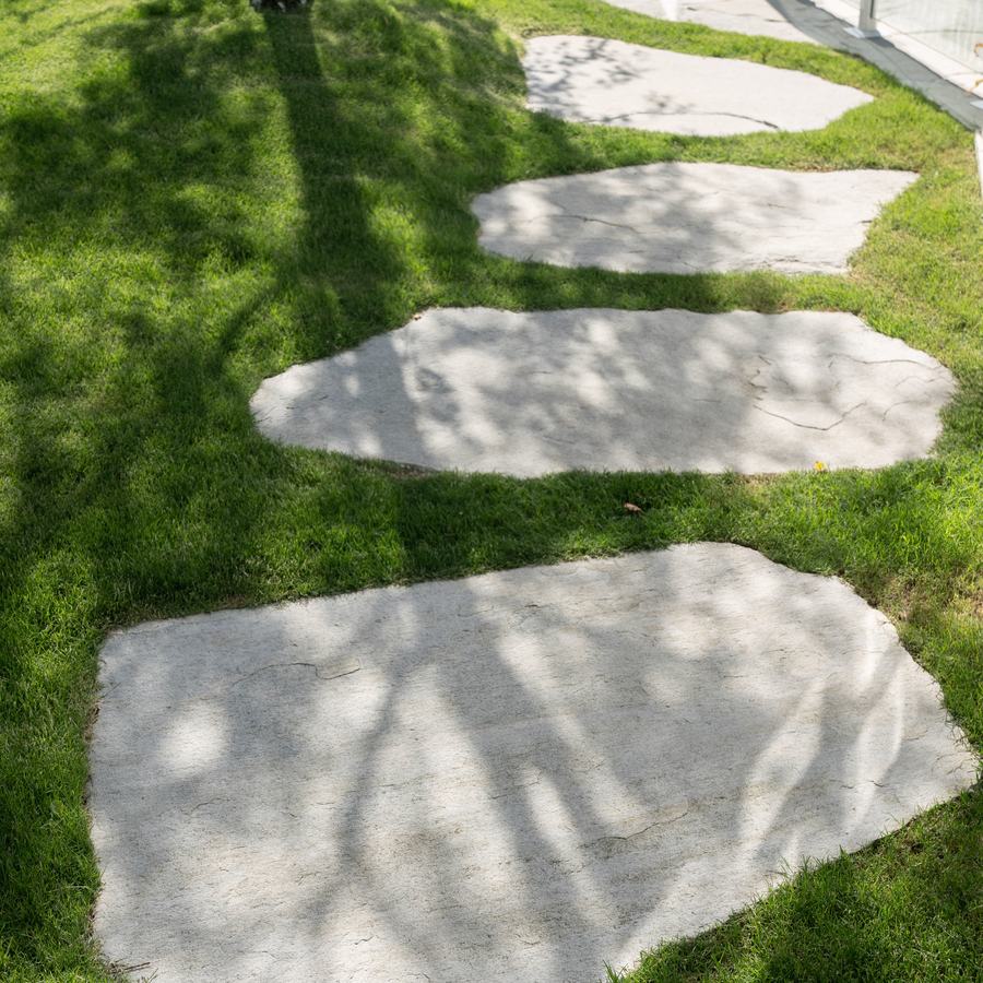 Williamstown. Stone steppers crossing the lawn to the pool terrace.