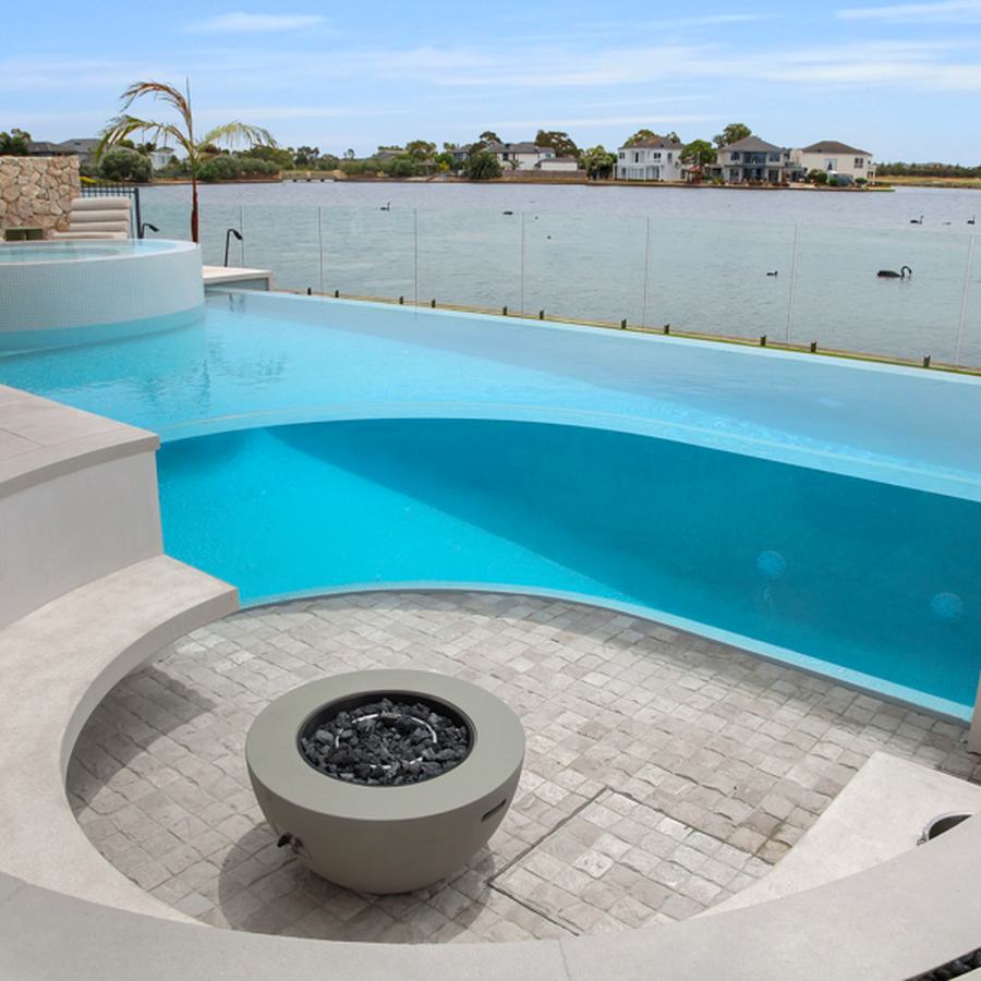 Point Cook. A glass-edged pool looking directly across the lake.